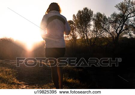 Woman relaxing in camp area, Bishop, California, USA View Large Photo Image Stock Photography - Woman relaxing in camp area, Bishop, California, USA. Fotosearch
