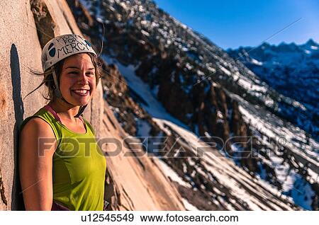 Woman rock climbing, Cardinal Pinnacle, Bishop, California, USA View Large Photo Image Stock Photo - Woman rock climbing, Cardinal Pinnacle, Bishop, California, USA. Fotosearch