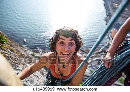 Woman rock climbing, Malamute, Squamish, Canada View Large Photo Image Stock Photo - Woman rock climbing, Malamute, Squamish, Canada. Fotosearch
