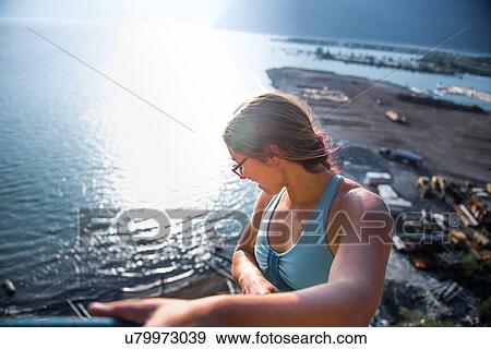 Woman rock climbing, Malamute, Squamish, Canada View Large Photo Image Stock Photo - Woman rock climbing, Malamute, Squamish, Canada. Fotosearch
