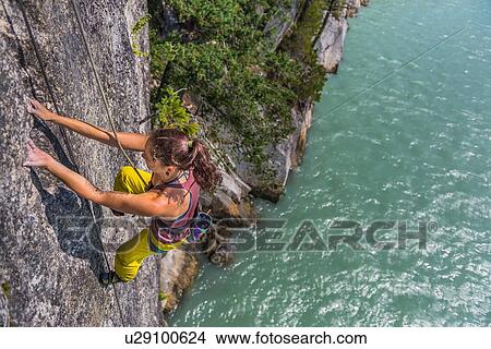Picture - Woman rock climbing, Squamish, Canada. Fotosearch