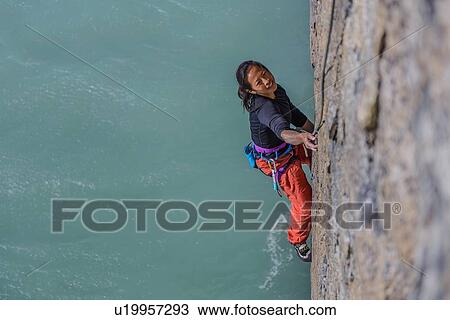 Woman rock climbing, Squamish, Canada View Large Photo Image Stock Image - Woman rock climbing, Squamish, Canada. Fotosearch