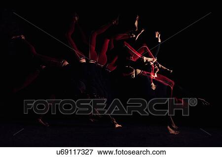 Stock Photo - Woman somersaulting. Fotosearch