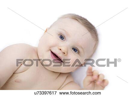 Baby lying down, portrait. View Large Photo Image Stock Photo - Baby lying down, portrait.. Fotosearch