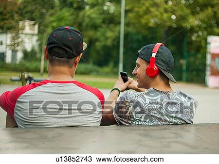 BMX cyclists resting beside ramp View Large Photo Image Stock Image - BMX cyclists resting beside ramp. Fotosearch