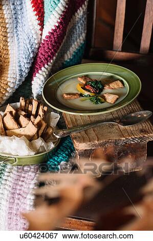 Bowl of fresh food on rustic kitchen table View Large Photo Image Stock Photo - Bowl of fresh food on rustic kitchen table. Fotosearch