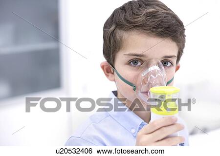 Boy using nebuliser. View Large Photo Image Stock Photograph - Boy using nebuliser.. Fotosearch