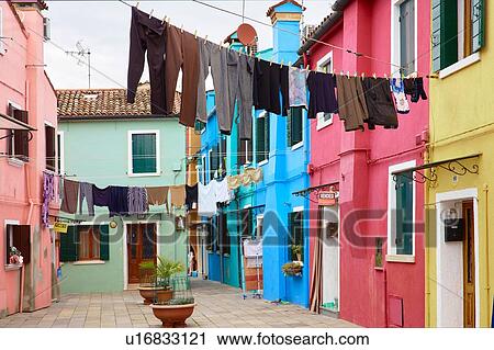 Clothes lines in traditional multicoloured courtyard, Burano, Venice, Veneto, Italy View Large Photo Image Stock Image - Clothes lines in traditional multicoloured courtyard, Burano, Venice, Veneto, Italy. Fotosearch