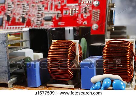 Stock Image - Computers circuit board components, close-up.. Fotosearch