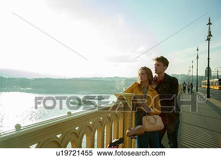Stock Photography - Couple enjoying view from bridge, Budapest, Hungary. Fotosearch