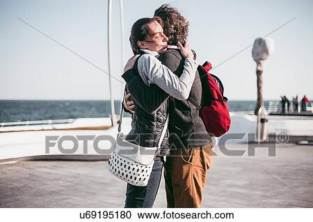 Couple hugging on sea waterfront, Odessa, Odeska Oblast, Ukraine View Large Photo Image Stock Image - Couple hugging on sea waterfront, Odessa, Odeska Oblast, Ukraine. Fotosearch