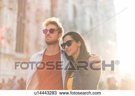 Couple sightseeing, Piazza del Duomo, Milan, Italy View Large Photo Image Stock Image - Couple sightseeing, Piazza del Duomo, Milan, Italy. Fotosearch