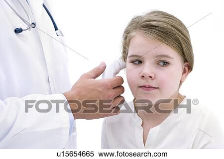 Doctor taking girl's temperature using digital thermometer View Large Photo Image Stock Photography - Doctor taking girl's temperature using digital thermometer. Fotosearch