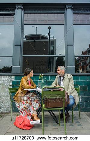 Friends at pavement cafe, London, UK View Large Photo Image Stock Image - Friends at pavement cafe, London, UK. Fotosearch