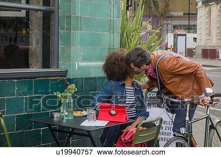 Friends meeting at pavement cafe, London, UK View Large Photo Image Stock Photo - Friends meeting at pavement cafe, London, UK. Fotosearch