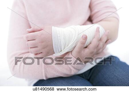Girl with bandaged arm. View Large Photo Image Stock Photo - Girl with bandaged arm.. Fotosearch