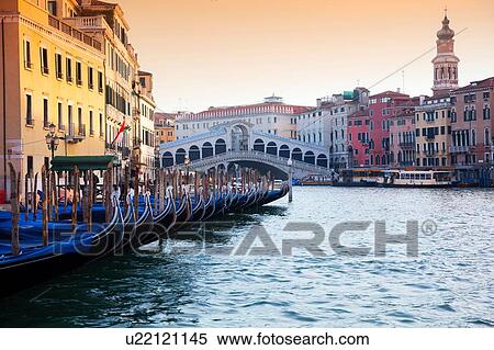 Gondolas on Grand canal near Rialto bridge, Venice, Veneto, Italy View Large Photo Image Stock Photography - Gondolas on Grand canal near Rialto bridge, Venice, Veneto, Italy. Fotosearch