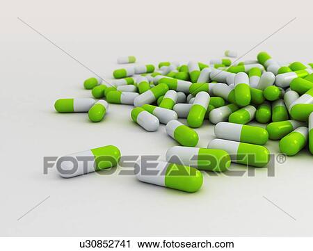 Stock Image - Green herbal pills in a large group close up image, illustration.. Fotosearch