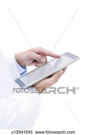 Male doctor using digital tablet. View Large Photo Image Stock Photography - Male doctor using digital tablet.. Fotosearch