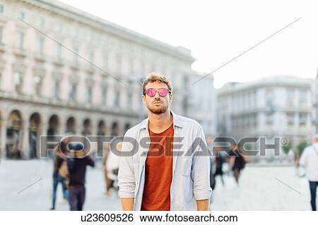 Man sightseeing, Piazza del Duomo, Milan, Italy View Large Photo Image Stock Photograph - Man sightseeing, Piazza del Duomo, Milan, Italy. Fotosearch
