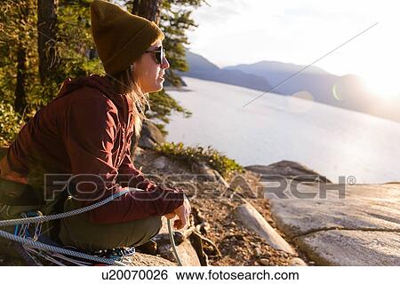 Rock climber enjoying sunset on Malamute, Squamish, Canada View Large Photo Image Stock Photograph - Rock climber enjoying sunset on Malamute, Squamish, Canada. Fotosearch