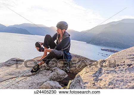 Stock Image - Rock climber on Malamute, Squamish, Canada. Fotosearch