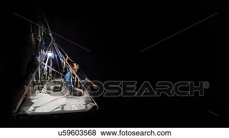 Rock climber on portaledge View Large Photo Image Stock Photo - Rock climber on portaledge. Fotosearch