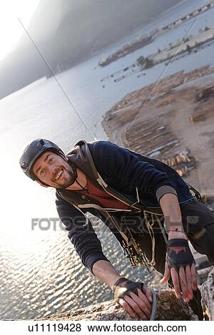 Rock climber using safety harness ropes, Malamute, Squamish, Canada View Large Photo Image Stock Photo - Rock climber using safety harness ropes, Malamute, Squamish, Canada. Fotosearch