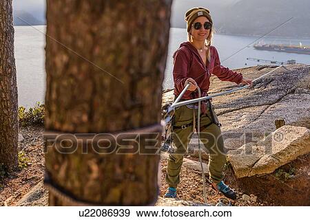 Rock climber using safety harness ropes, Malamute, Squamish, Canada View Large Photo Image Stock Photo - Rock climber using safety harness ropes, Malamute, Squamish, Canada. Fotosearch