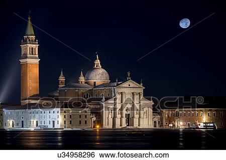 Stock Photograph - San Giorgio Maggiore church and moon at night, Venice, Veneto, Italy. Fotosearch