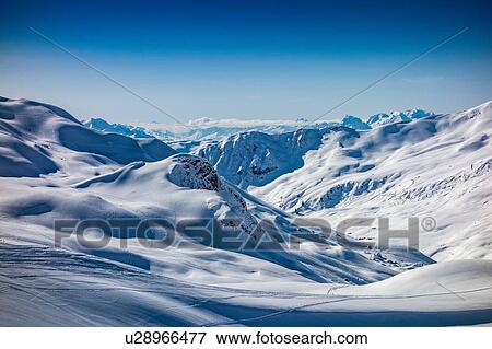Stock Photo - Snow covered Alps, Davos Platz, Graubunden, Switzerland. Fotosearch