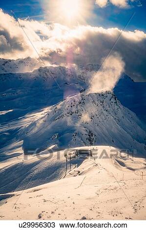 Snow covered alps on sunny day, Arosa, Graubunden, Switzerland View Large Photo Image Stock Image - Snow covered alps on sunny day, Arosa, Graubunden, Switzerland. Fotosearch