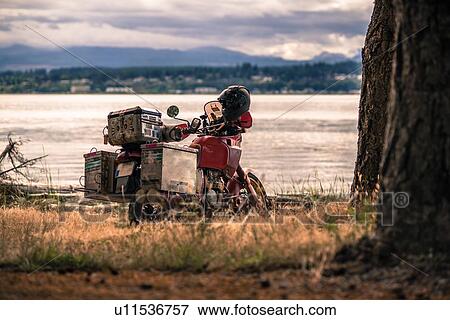 Touring motorcycle by Campbell River, Vancouver, Canada View Large Photo Image Stock Photo - Touring motorcycle by Campbell River, Vancouver, Canada. Fotosearch