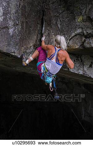Stock Image - Trad climbing roof of My Little Pony route in Squamish, Canada. Fotosearch