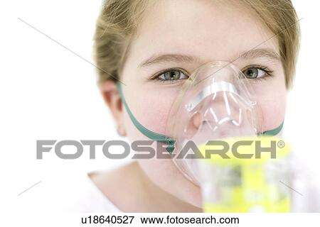 Young girl using nebuliser. View Large Photo Image Stock Photo - Young girl using nebuliser.. Fotosearch