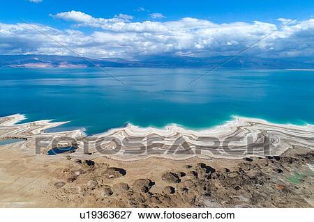 Stock Photo - Aerial photography with drone. elevated view of Dead Sea shoreline, Israel. Fotosearch