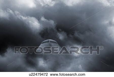 Airplanes cockpit seen through dark clouds and stormy weather. View Large Photo Image Stock Image - Airplanes cockpit seen through dark clouds and stormy weather.. Fotosearch