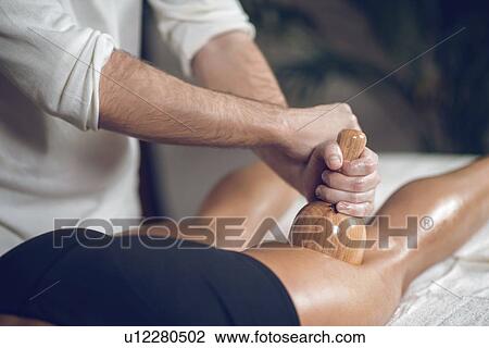 Anti-cellulite maderotherapy massage View Large Photo Image Stock Image - Anti-cellulite maderotherapy massage. Fotosearch