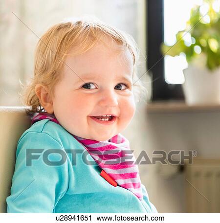 Baby girl with smiling eyes View Large Photo Image Stock Image - Baby girl with smiling eyes. Fotosearch