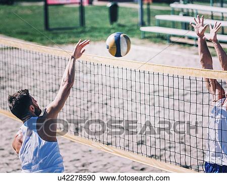Beach volleyball game View Large Photo Image Stock Image - Beach volleyball game. Fotosearch