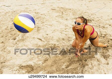 Beach volleyball player View Large Photo Image Picture - Beach volleyball player. Fotosearch