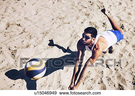 Stock Photo - Beach volleyball player. Fotosearch