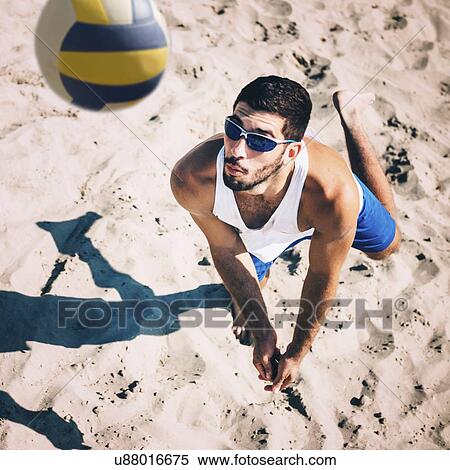 Stock Photography - Beach volleyball service. Fotosearch