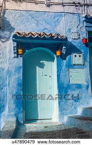 Stock Photo - Blue painted house exterior and doorway, Chefchaouen, Morocco. Fotosearch