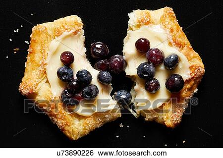 Blueberry galette, overhead view View Large Photo Image Stock Photograph - Blueberry galette, overhead view. Fotosearch