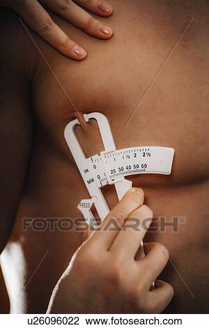 Body fat measurement View Large Photo Image Stock Image - Body fat measurement. Fotosearch