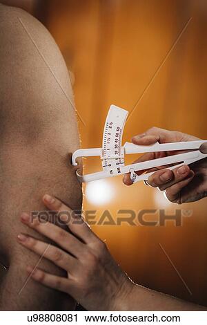 Body fat measurement View Large Photo Image Stock Image - Body fat measurement. Fotosearch
