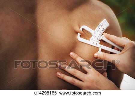 Body fat measurement View Large Photo Image Stock Photography - Body fat measurement. Fotosearch
