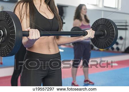 Body pump fitness class View Large Photo Image Stock Photo - Body pump fitness class. Fotosearch