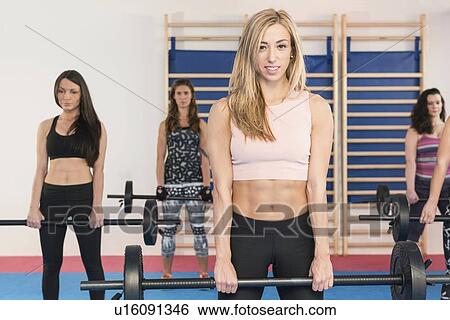Body pump fitness class View Large Photo Image Stock Photograph - Body pump fitness class. Fotosearch